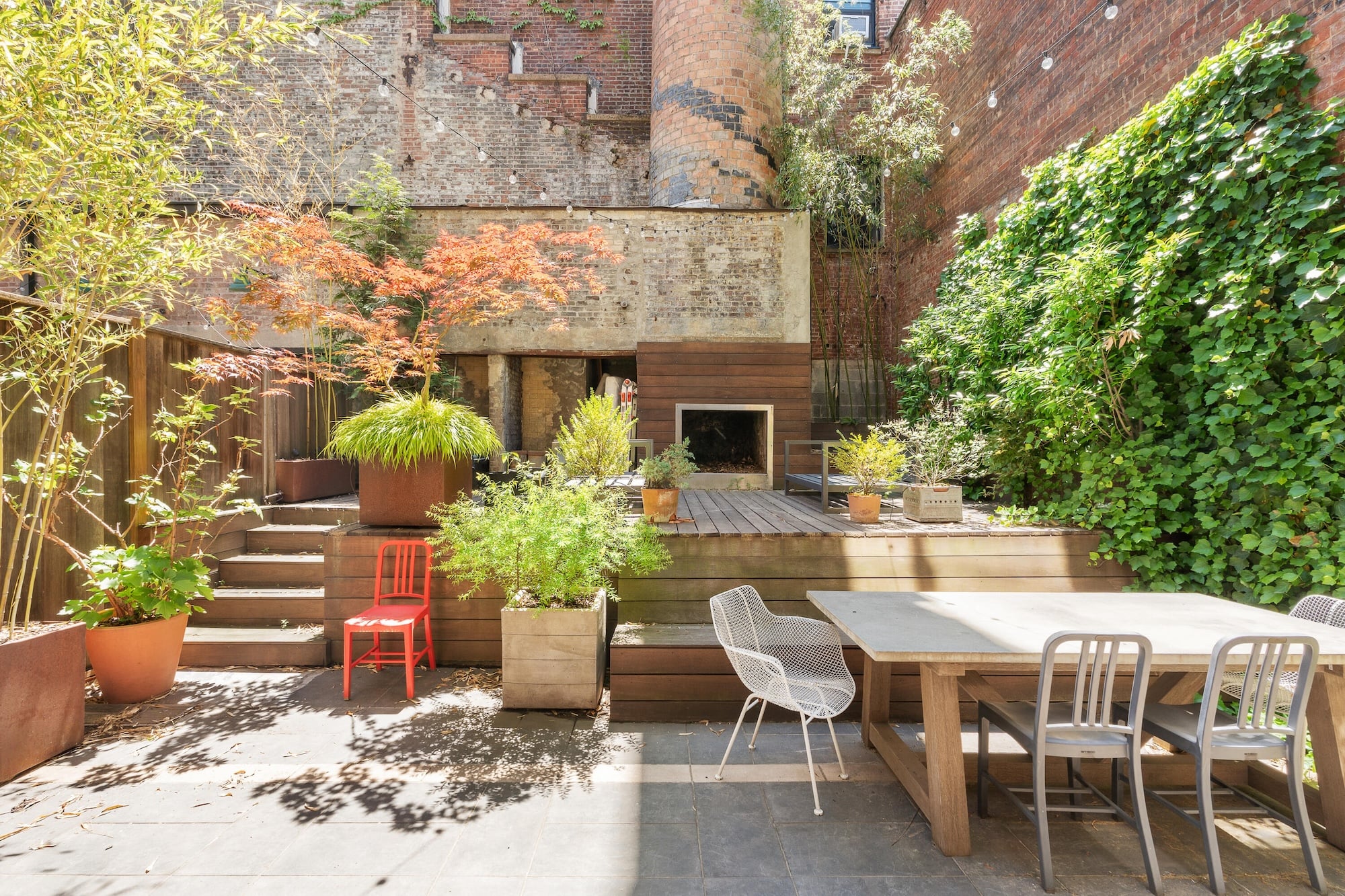 A New York City row house at 130 Jackson Street showing a below-grade unit