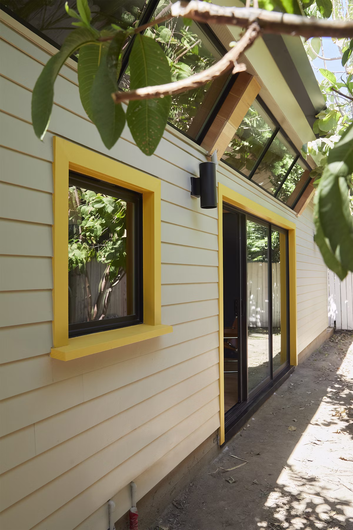 Compact ADU studio with kitchen and living zone combined in a small footprint