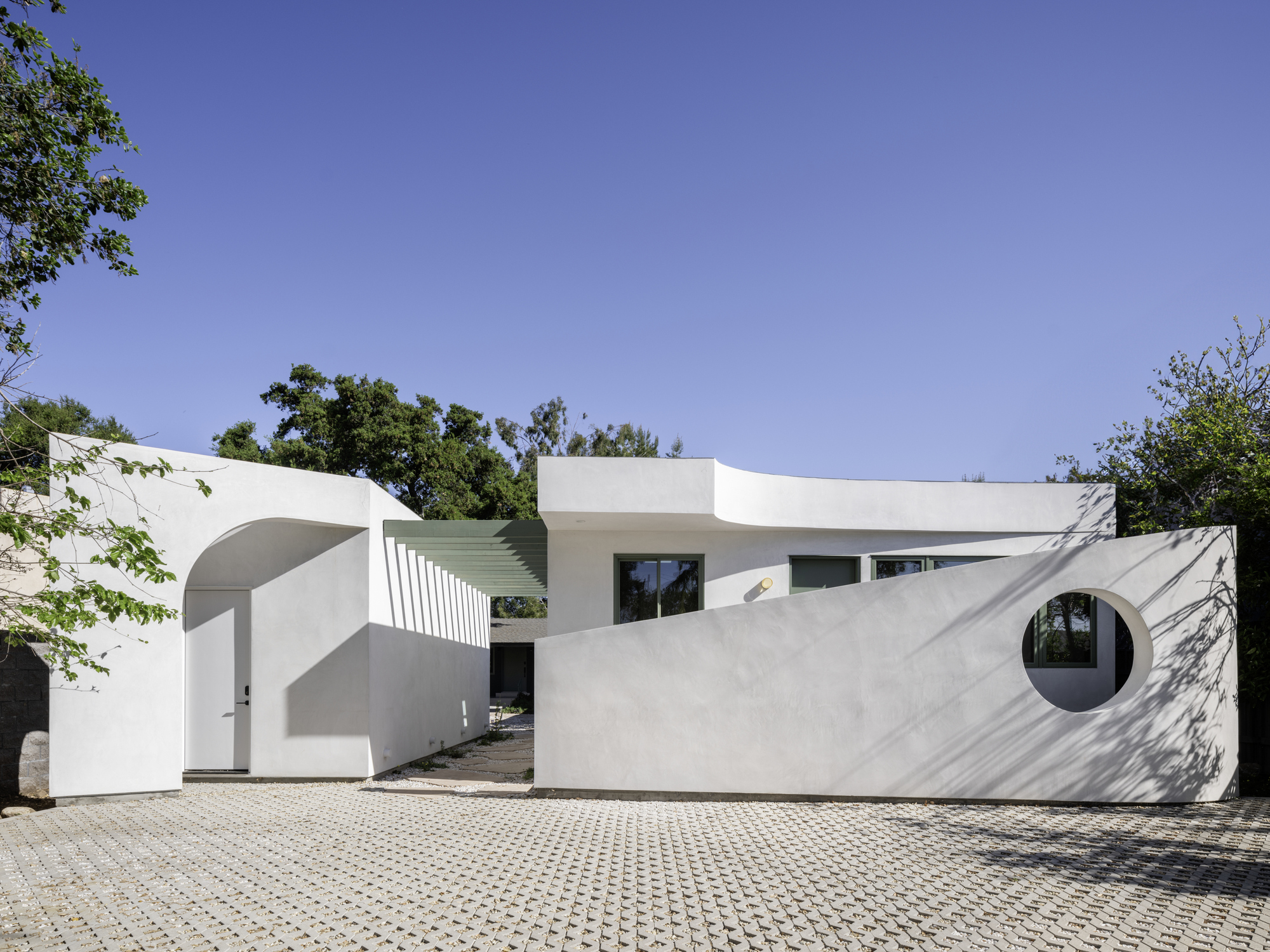 The 620-square-foot Moongate ADU sited behind the primary house on the same Altadena lot