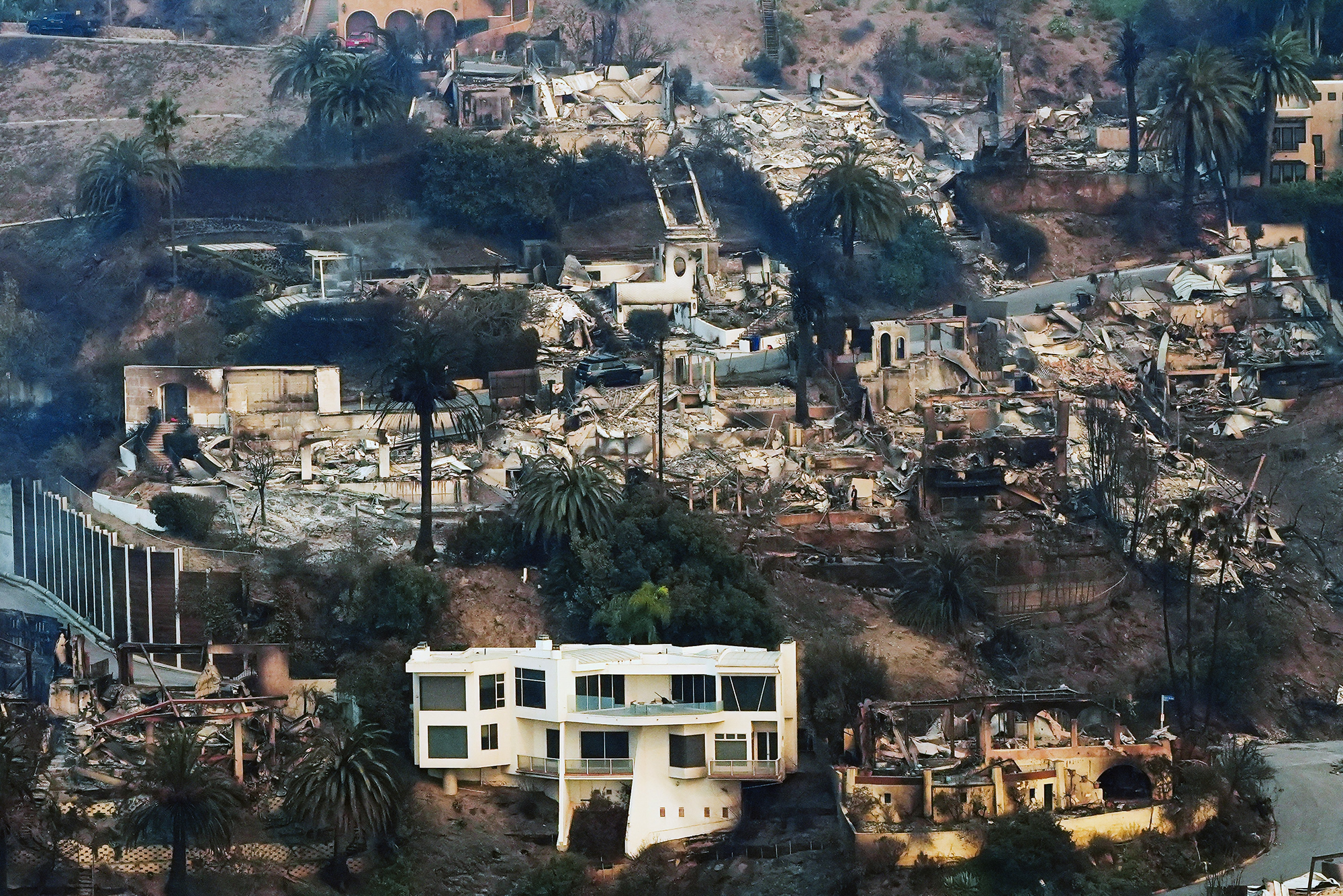 A California wildfire burn zone, the kind of landscape Altadena families are rebuilding across