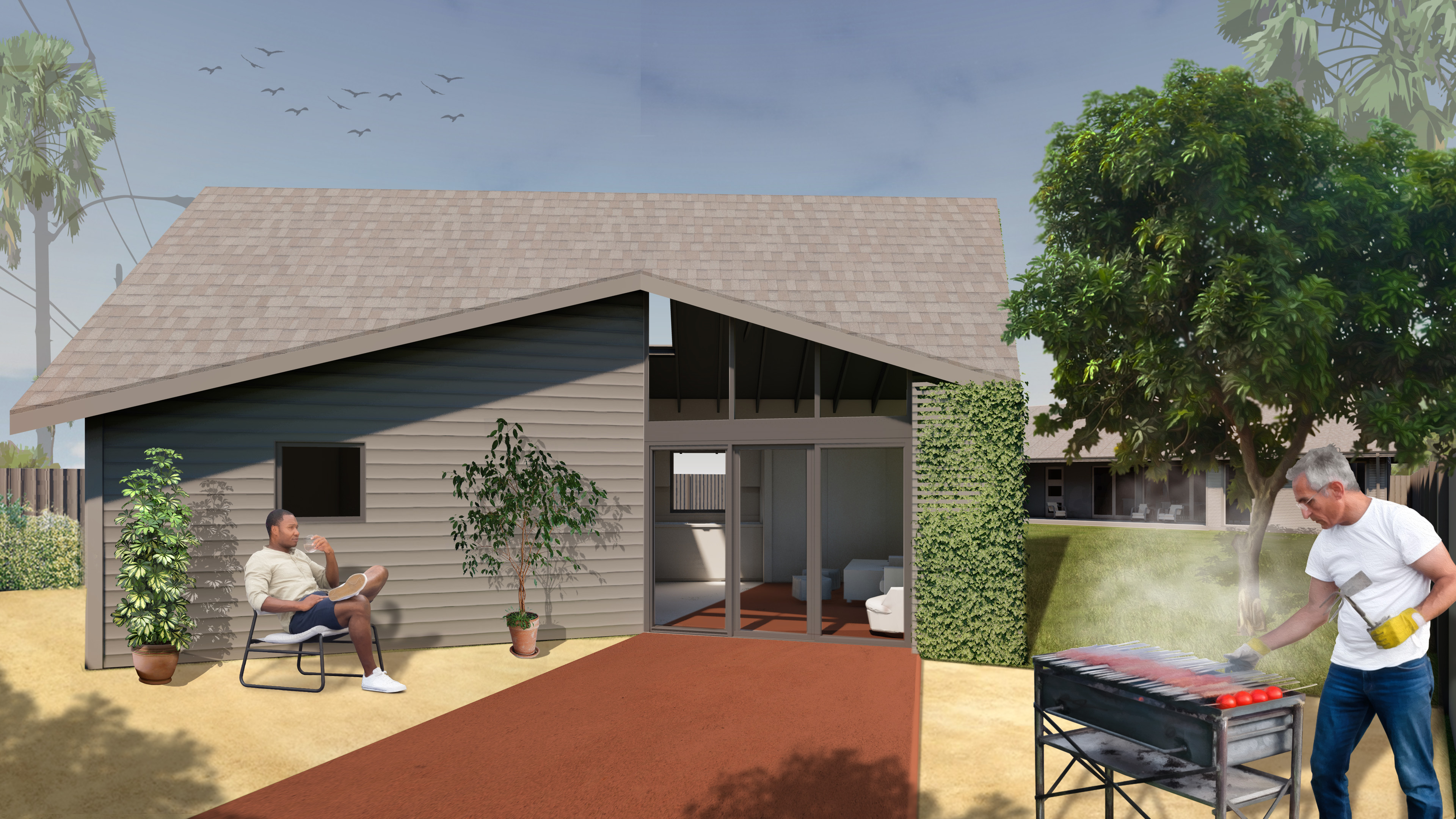 The YOU-ADU in its charcoal Guest configuration, with dark siding and bronze-finish doors, set in a garden behind a main house