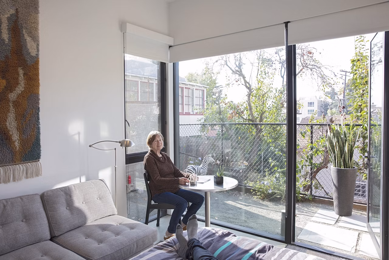 Kleines Haus sits downslope in the backyard behind the main two-story Oakland house