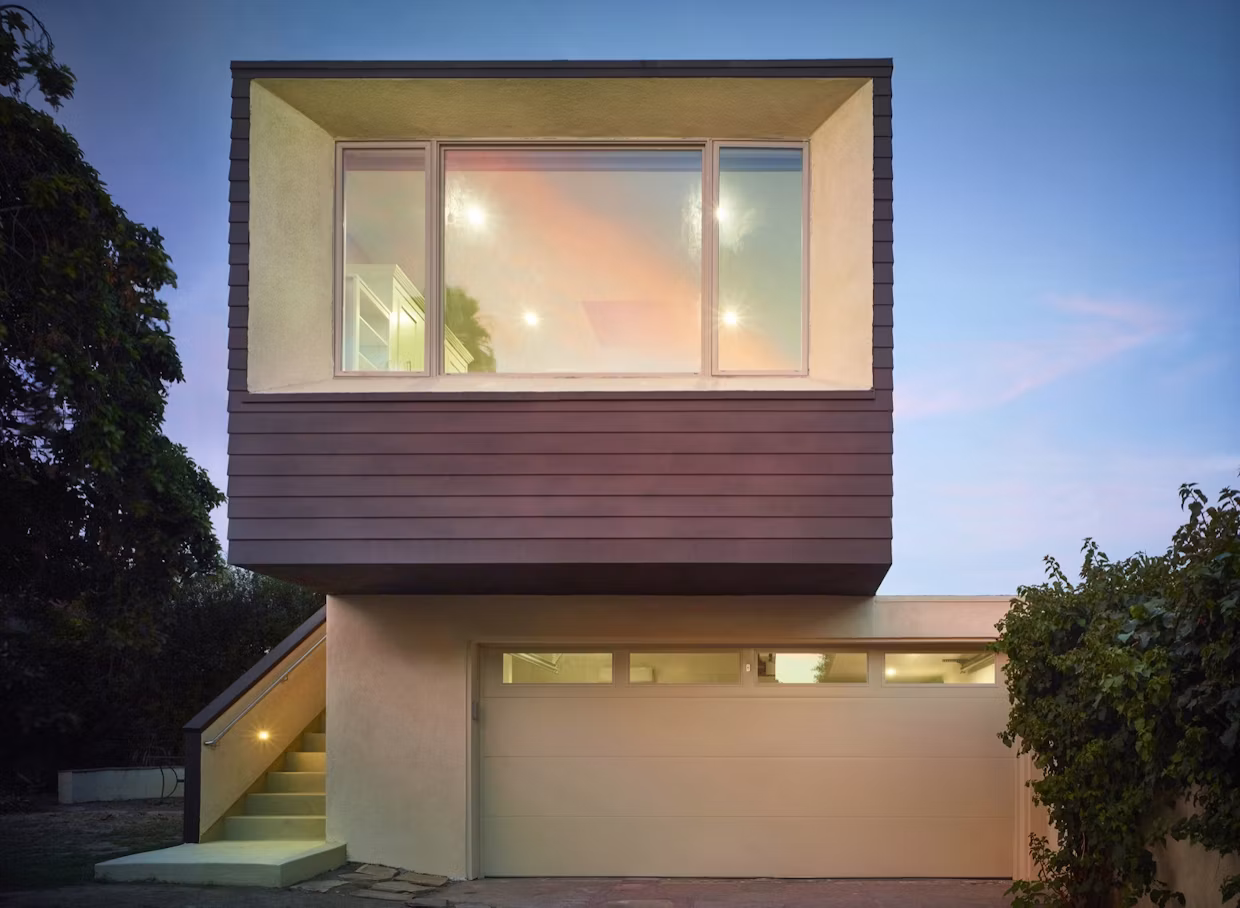 Interior of the 350-square-foot Rodgers ADU studio, lit by large windows and a skylight