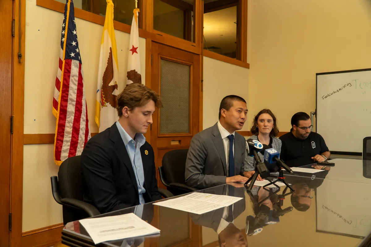 Supervisor Alan Wong and housing advocates at a City Hall press conference on San Francisco's in-law ceiling height ordinance